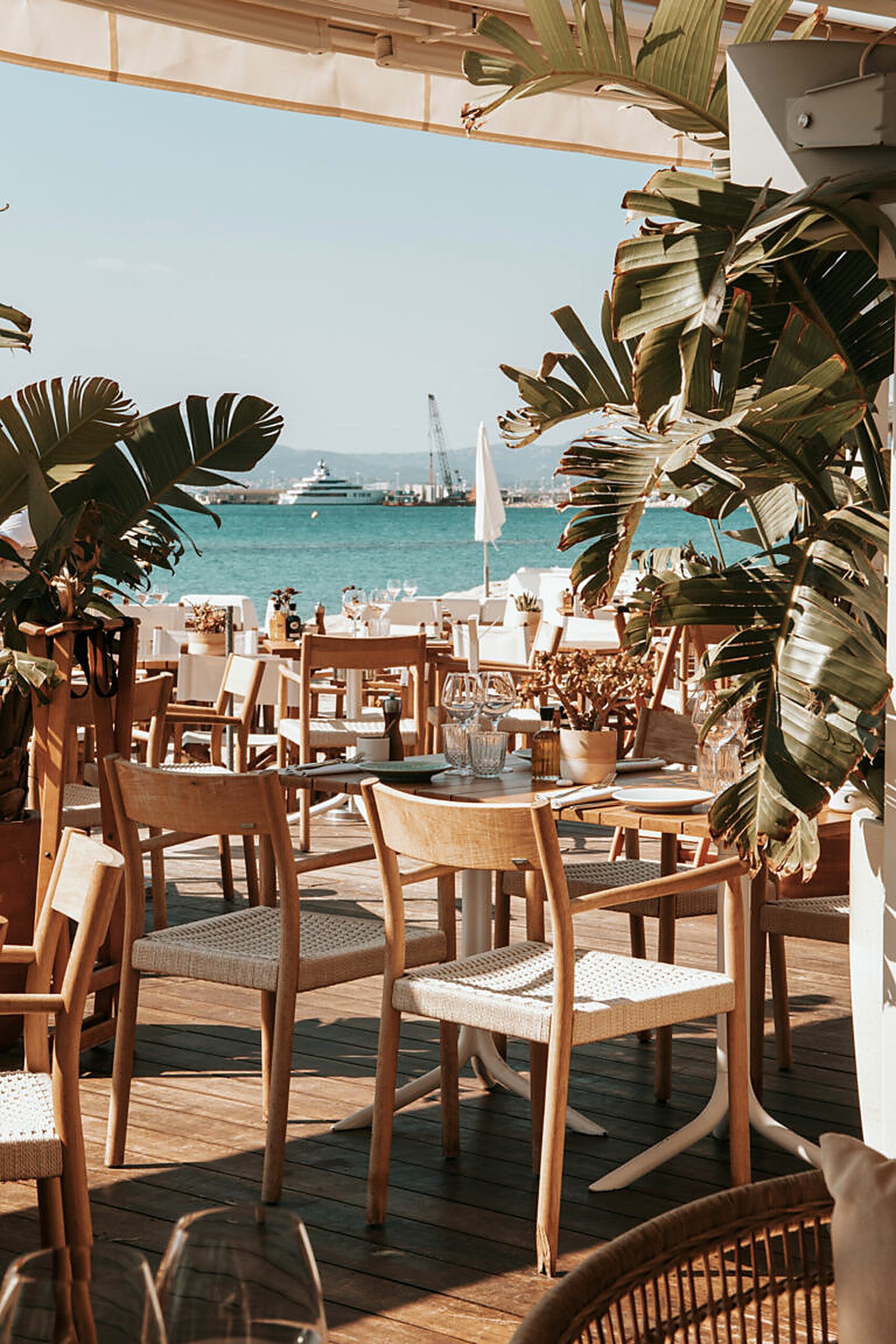 Beach club lunch terrace facing the sea