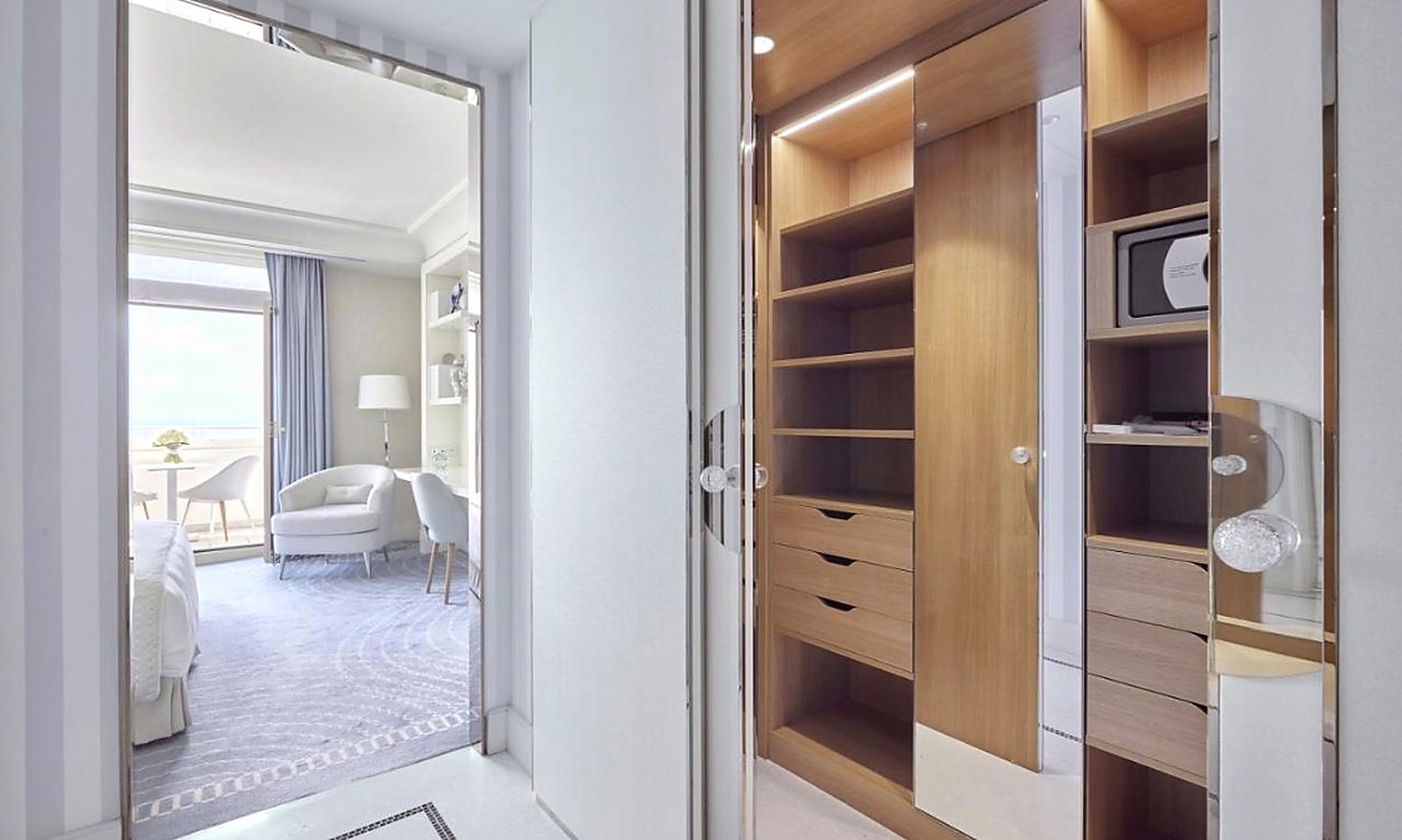 Bright room interior opening onto the balcony